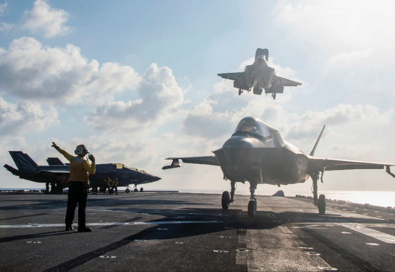F-35B Lightning II fighter aircraft assigned to 31st Marine Expeditionary Unit, Marine Medium Tiltrotor 265 (Reinforced), lands on flight deck ofamphibious assault ship USS America, South China Sea, April 19, 2020 (U.S. Navy/Vance Hand)